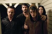 Aaron Paul as Francis, Garret Dillahunt as Krug, Spencer Treat Clark as Justin and Riki Lindhome as Sadie in "The Last House on the Left."