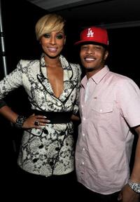 Keri Hilson and Tip "T.I." Harris at the after party of the California premiere of "Takers."