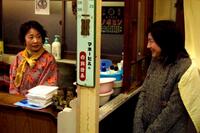Kazuko Yoshiyuki as Tsuyako Yamashita and Ryoko Hirosue as Mika Kobayashi in "Departures."
