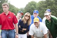 Sandra Bullock as Leigh Anne Tuohy, Phillip Fulmer as Himself and Ray McKinnon as Coach Cotton in "The Blind Side."