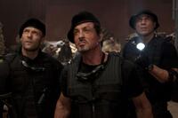 Jason Statham as Lee Christmas, Sylvester Stallone as Barney Ross and Randy Couture as Toll Road in "The Expendables."
