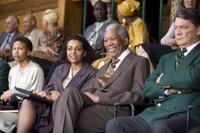 Leleti Khumalo as Mary, Adjoa Andoh as Brenda Mazibuko, Morgan Freeman as Nelson Mandela and Danny Keogh as Rugby President in "Invictus."