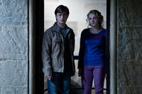 Daniel Radcliffe as Harry Potter and Evanna Lynch as Luna Lovegood in "Harry Potter and The Deathly Hallows: Part 2."