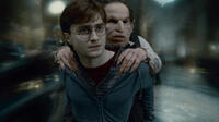 Daniel Radcliffe as Harry Potter and Warwick Davis as Griphook in "Harry Potter and The Deathly Hallows: Part 2."