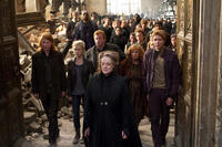Domhnall Gleeson as Bill Weasley, Clemence Poesy as Fleur Delacour, Mark Williams as Arthur Weasley, Maggie Smith as Professor Minerva Mcgonagall, Julie Walters as Molly Weasley and Oliver Phelps as George Weasley in "Harry Potter and The Deathly Hallows: Part 2."