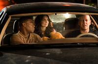 Tracy Morgan as Paul, Ana De La Reguera as Gabriela and Bruce Willis as Jimmy in "Cop Out."