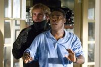Seann William Scott as Dave and Tracy Morgan as Paul in "Cop Out."