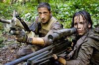 Adrien Brody as Royce and Alice Braga as Isabelle in "Predators."