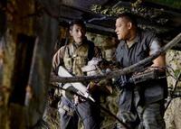 Adrien Brody as Royce and Laurence Fishburne as Noland in "Predators."