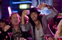 Colm Meaney as Jonathan and Russell Brand as Aldous in "Get Him to the Greek."