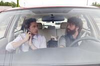 Robert Downey Jr., as Peter and Zach Galifianakis as Ethan in "Due Date."