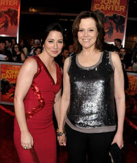 Lynn Collins and Sigourney Weaver at the California premiere of "John Carter."