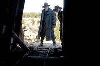 Jeff Bridges as Rooster Cogburn and Hailee Steinfield as Mattie Ross in "True Grit"