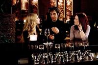 Amanda Seyfried, Atom Egoyan and Julianne Moore on the set of "Chloe."