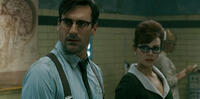 Jon Hamm as Doctor and Carla Gugino as Dr. Vera Gorski in "Sucker Punch."