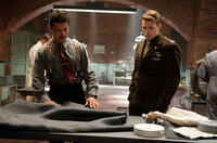 Dominic Cooper as Howard Stark and Chris Evans as Steve Rogers in "Captain America: The First Avenger."