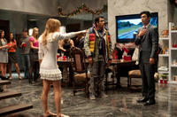 Jordan Hinson as Mary, Kal Penn as Kumar and John Cho as Harold in "A Very Harold & Kumar Christmas."