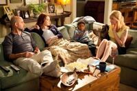 Stanley Tucci as Olive's father Dill, Emma Stone as Olive, Bryce Clyde Jenkins as Chip and Patricia Clarkson as Rosemary in "Easy A."