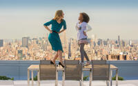 Rose Byrne as Grace and Quvenzhane Wallis as Annie in "Annie."