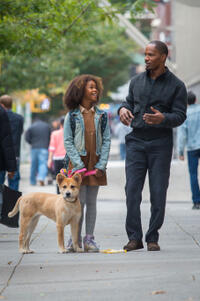 Quvenzhane Wallis as Annie and Jamie Foxx as Will Stacks in "Annie."