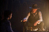 Noah Ringer as Emmett and Harrison Ford as Colonel Dolarhyde in "Cowboys & Aliens."