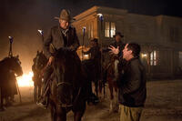 Harrison Ford and director/executive producer Jon Favreau on the set of "Cowboys & Aliens."
