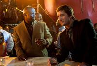 Terry Crews as James and Luke Wilson as Jack Harris in "Middle Men."