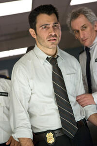 Joshua Peace as Detective Markowitz in "The Night Chronicles: Devil"