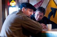 Liam Neeson as Damon and Russell Crowe as John Brennan in "The Next Three Days."