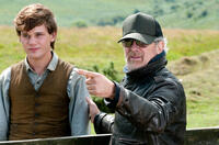 Jeremy Irvine and Director Steven Spielberg on the set of "War Horse."