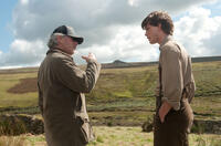 Director Steven Spielberg and Jeremy Irvine on the set of "War Horse."
