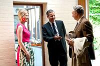 Rosamund Pike as Lisa Hopkins, Rupert Graves as Hopkins and Richard Schiff as Robert Tooley in "Made in Dagenham."