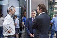 Director Neil Burger with Robert de Niro and Bradley Cooper on the set of "Limitless."