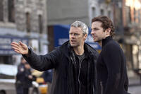 Director Neil Burger with Bradley Cooper on the set of "Limitless."
