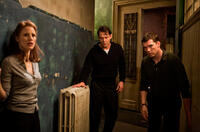 Jessica Chastain, Marton Csokas and Sam Worthington in "The Debt."