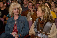 Jane Lynch as Pat Stevens and Kristen Wiig as Ruth Buggs in "Paul."