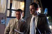 Joe Lo Truglio as Agent O'Reilly and Bill Hader as Agent Haggard in "Paul."