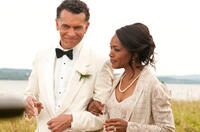 Brian Stokes Mitchell as Mr. Watson and Angela Bassett as Mrs. Watson in "Jumping the Broom."