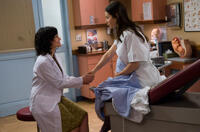 Carla Gugino as Dr. Morriset and Jessica Biel as Tess in "New Year's Eve."