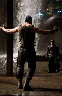 Tom Hardy as Bane and Christian Bale as Batman in "The Dark Knight Rises."