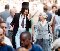 Russell Brand as Arthur and Helen Mirren as Hobson in "Arthur."