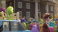 Mike Wazowski voiced by Billy Crystal and Dean Hardscrabble voiced by Helen Mirren in "Monsters University."