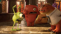 Mike Wazowski voiced by Billy Crystal and Professor Knight voiced by Alfred Molina in "Monsters University."