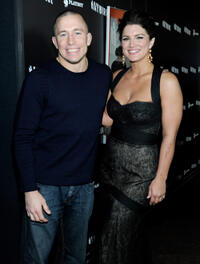 UFC fighter Georges St-Pierre and Gina Carano at the California premiere of "Haywire."