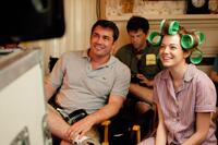 Director Tate Taylor, producer Brunson Grenn and Emma Stone on the set of "The Help."