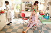 Roslyn Ruff as maid Pascagoula, Emma Stone as Skeeter Phelan and Allison Janney as Charlotte Phelan in "The Help."