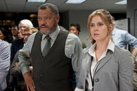 Laurence Fishburne as Perry White and Amy Adams as Lois Lane in "Man of Steel."