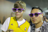 Justin Bieber with director Jon M. Chu in "Justin Bieber: Never Say Never."