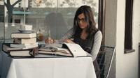 Camilla Belle as Nora in "From Prada to Nada."