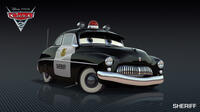 Poster art for "Cars 2."